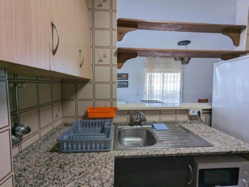 Alquiler apartamentos | Agencia Beltrán | Ref. 508 Los corales | Primera línea de playa | Piscina y parking | Cocina